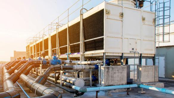 A set of cooling towers in a data center building is installed on the roof.