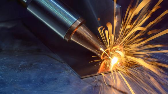 Close up scene the laser welding process by hand held laser welding machine. The high technology welding process by laser welding machine.