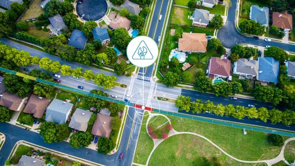 Aerial View Looking Straight Down Above Suburban Neighborhood in North Austin / Roudn Rock , Texas at an All way stop with community park modern layout and Cul De Sac Rooftops and Homes