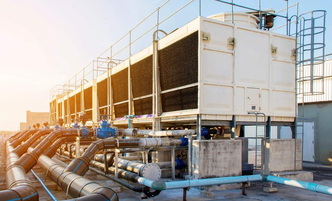 A set of cooling towers in a data center building is installed on the roof.